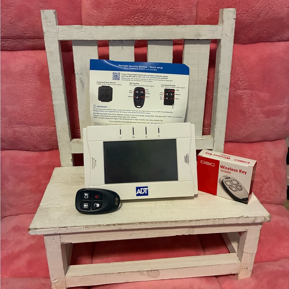 ADT Security Touchscreen and Programmable Remote.